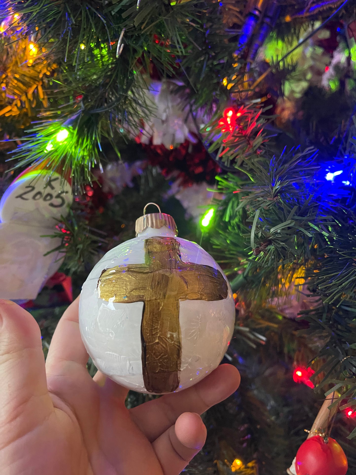 Hand-painted glass Christmas ornament by Tracee Gentry Matthews