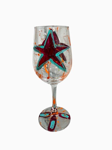 Hand-painted star wine glass by Tracee Gentry Matthews