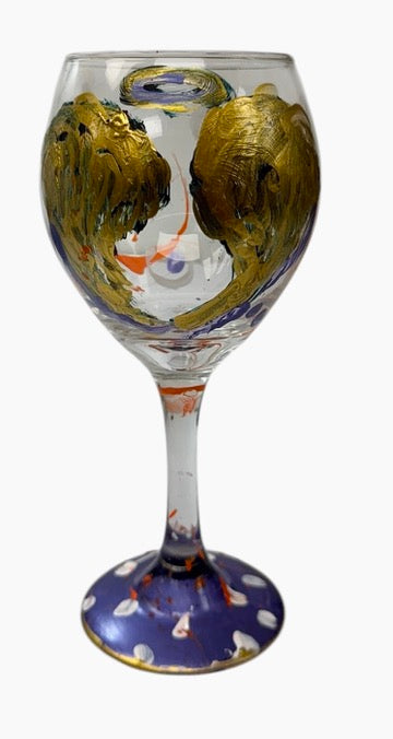 Hand-painted angel wing wine glasses by Tracee Gentry Matthews