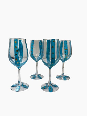 Hand-painted blue and gold wine glass by Tracee Gentry Matthews