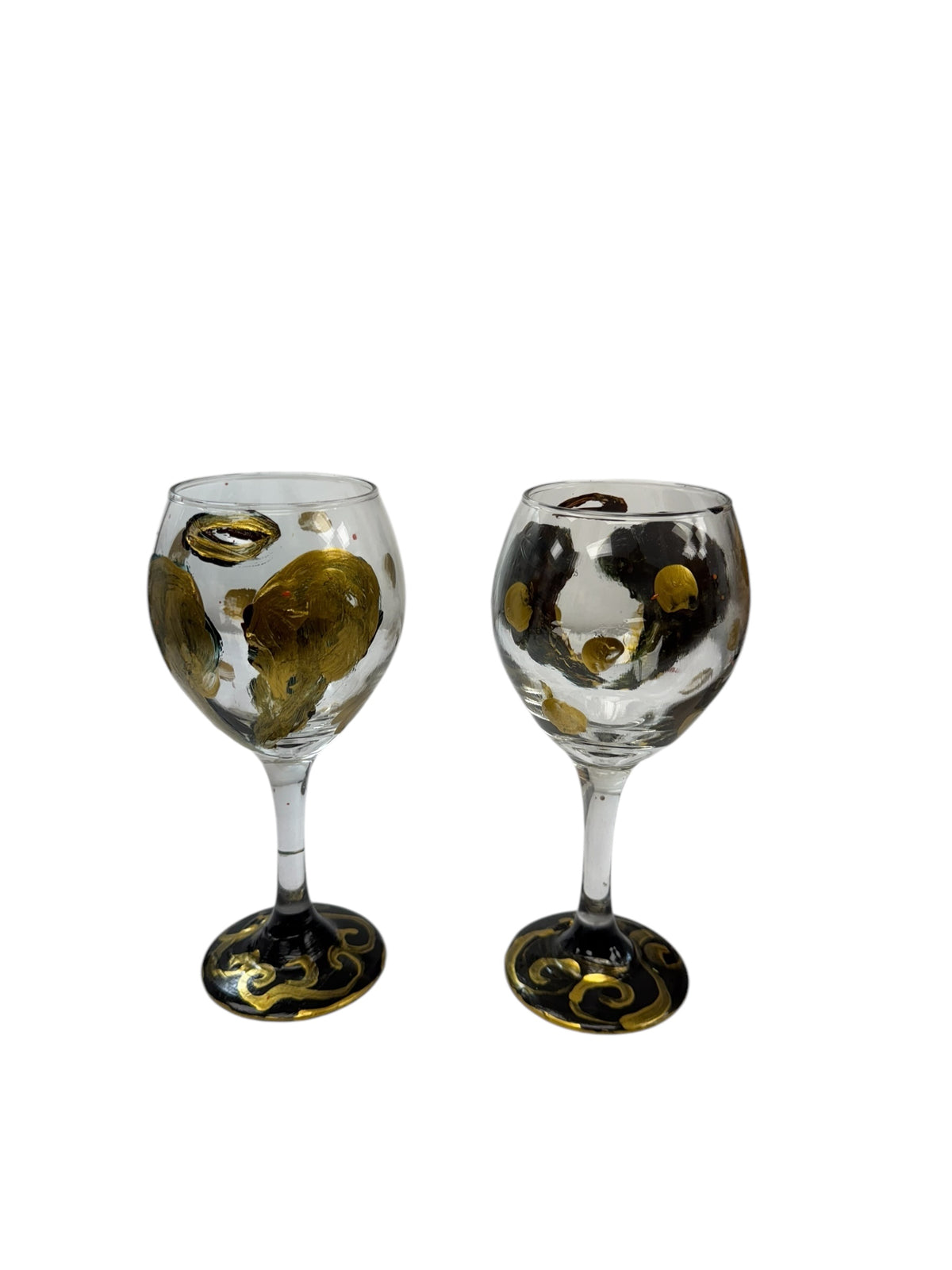 Hand-painted angel wing wine glass by Tracee Gentry Matthews
