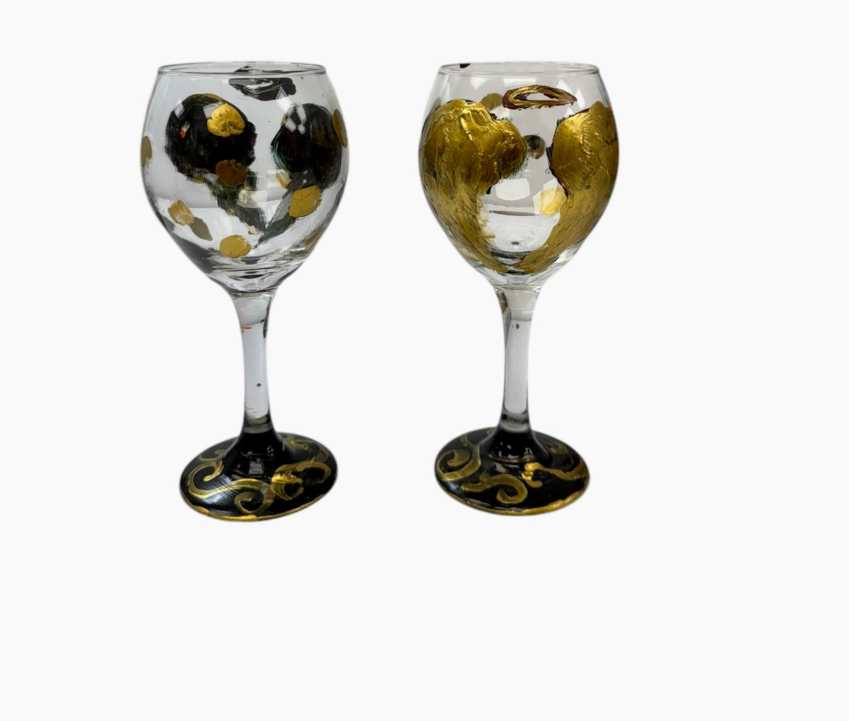 Hand-painted angel wing wine glass by Tracee Gentry Matthews