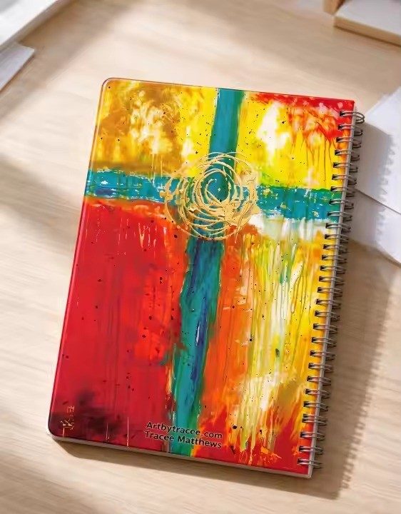 Cross art notebook by Tracee Gentry Matthews, spiral notebook on a table